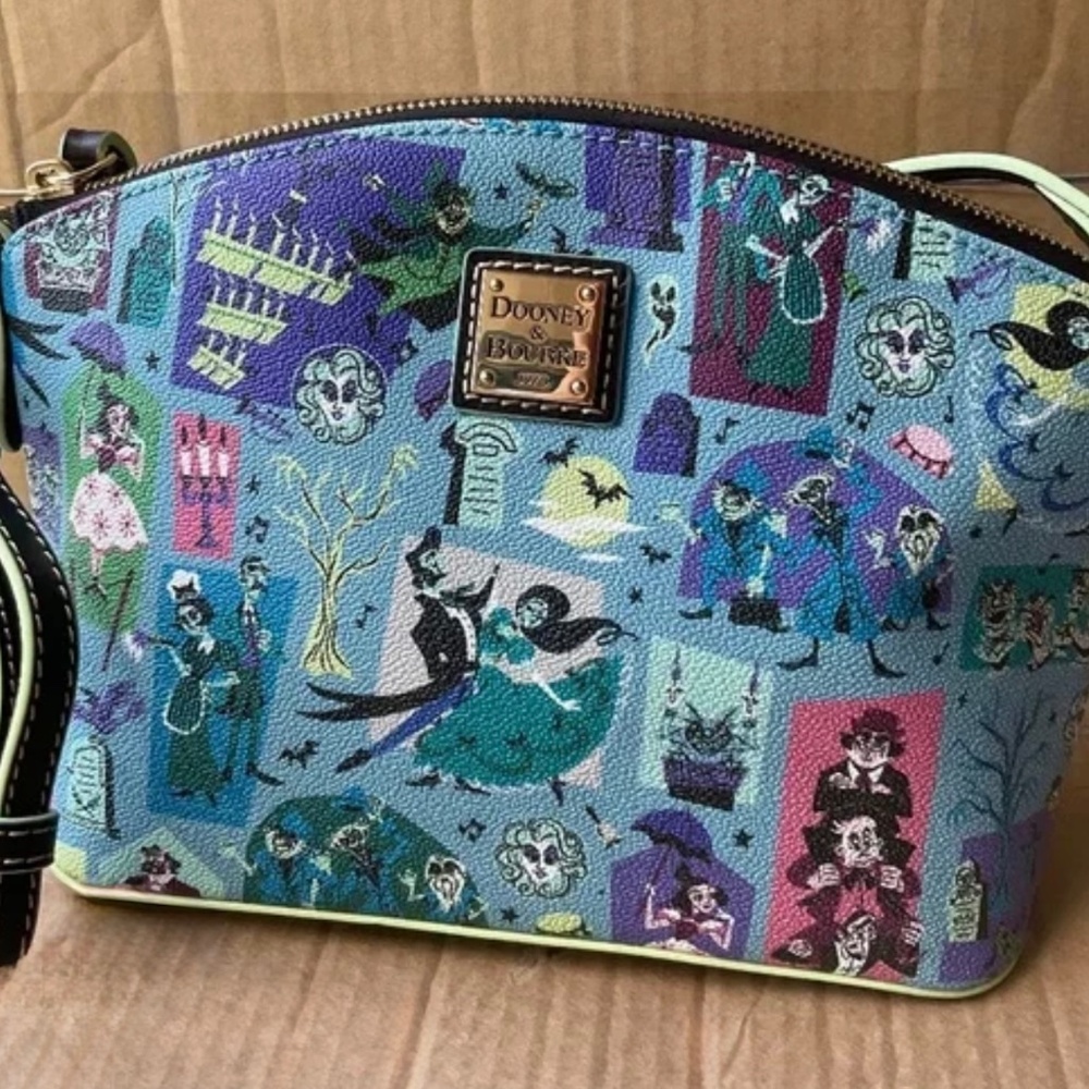 DOONEY and BOURKE  HAUNTED MANSION CROSSBODY NWT .